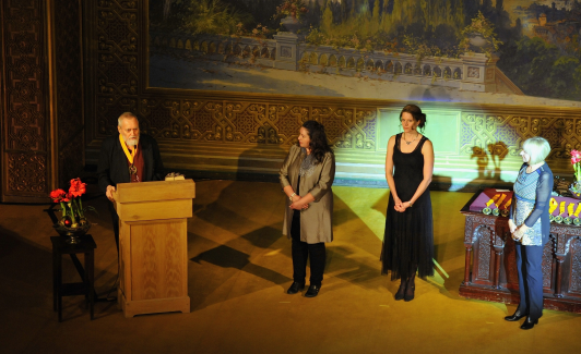 Estevan Arellano receives Luminaria medal. Photo by Seth Roffman, Editor, Green Fire Times.